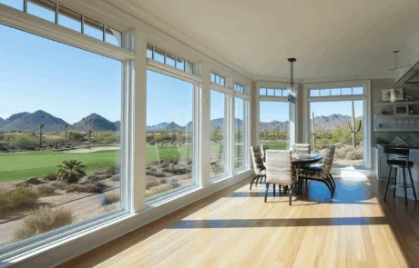 Windows overlooking a golf course from a dining area