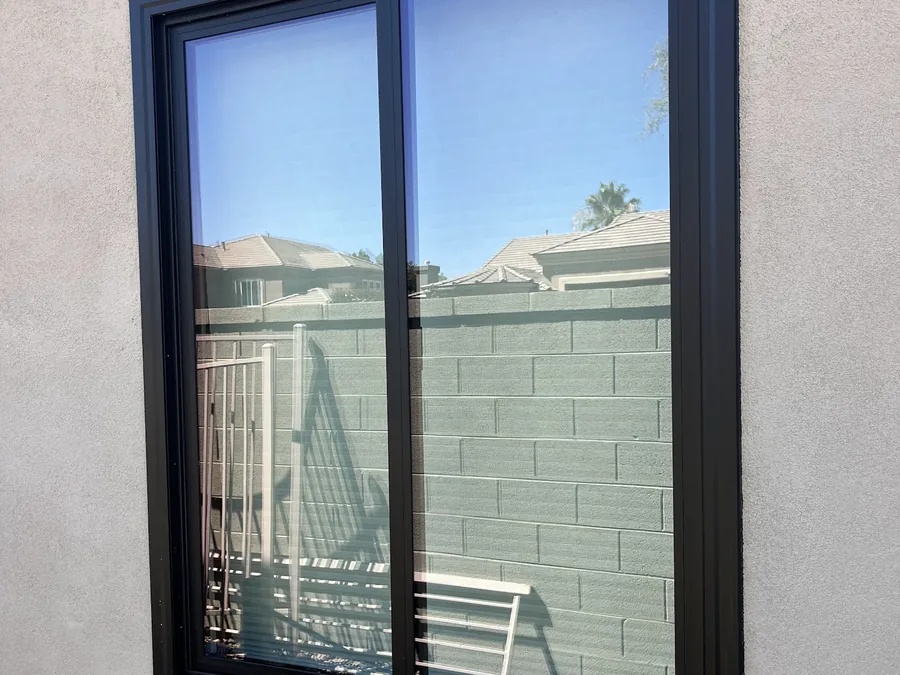 Black-framed horizontal sliding window on a Noble project in the Phoenix area