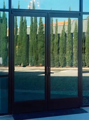 PRL Glass Systems narrow stile aluminum double doors in a black finish